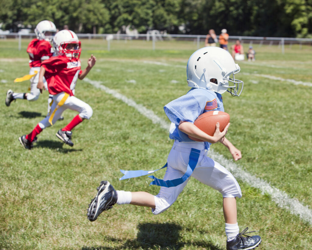 Kids playing flag American football